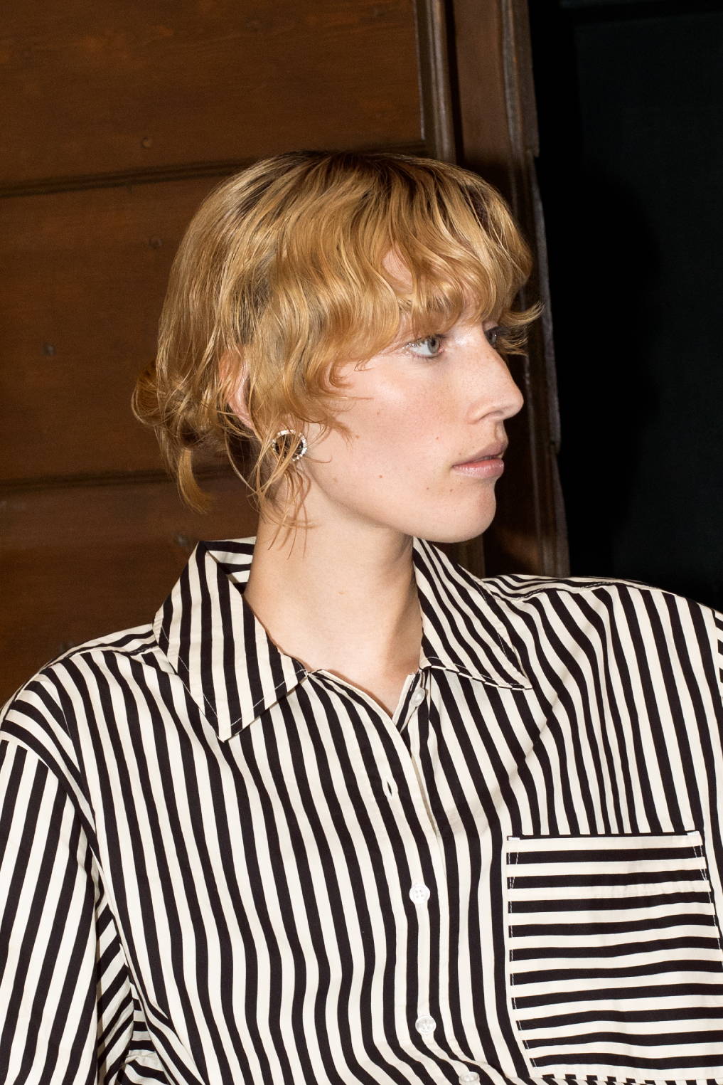 woman with blonde hair and bangs