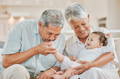 Grandparents spending time with their grandchild