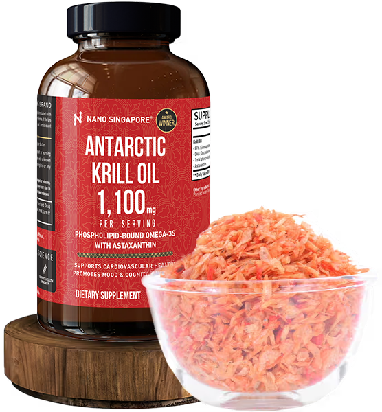 a bottle of krill oil singapore next to a bowl of krill