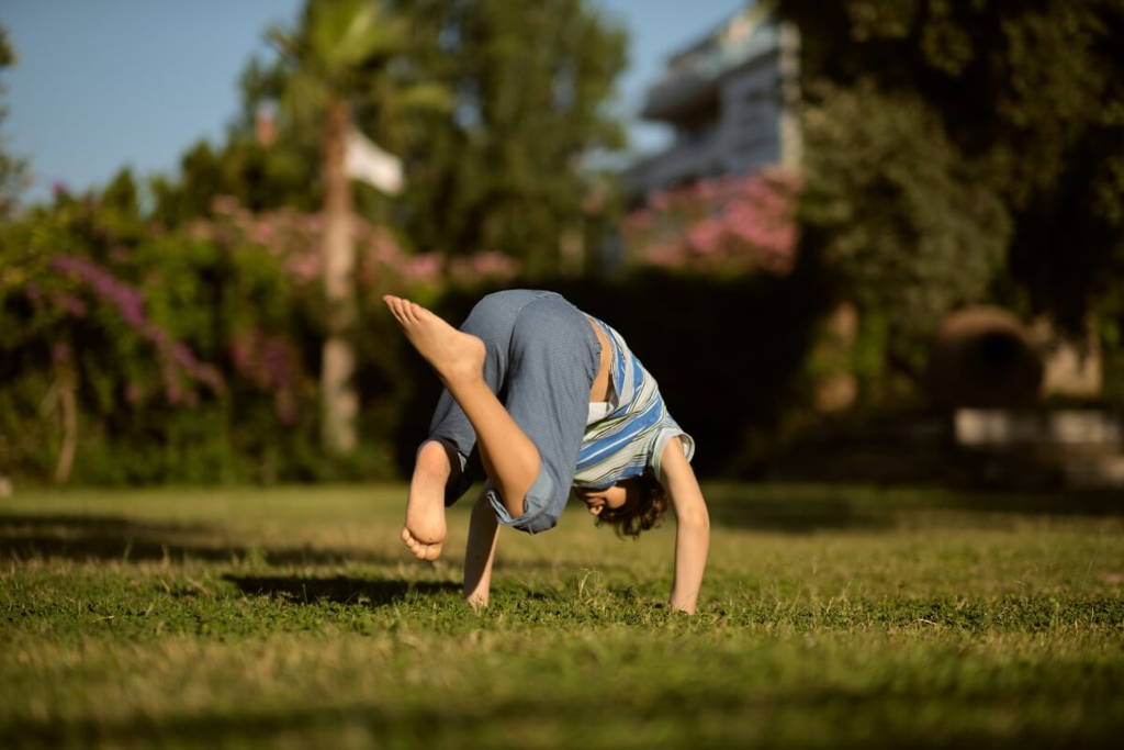 Child enjoying a physical activity in the park.