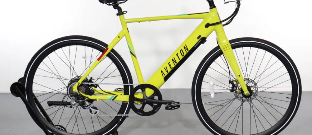 a yellow Aventon Soltera electric city bike