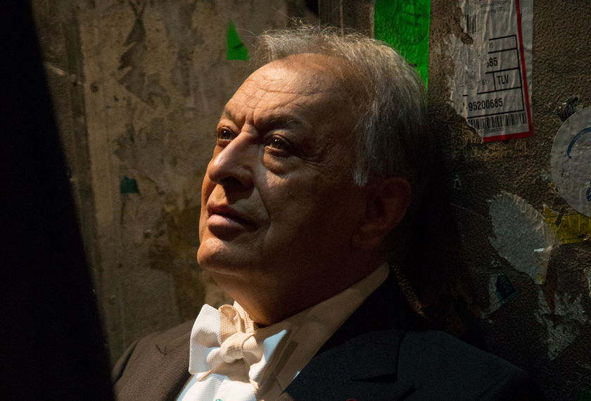 Close up portrait of Zubin Mehta wearing a tuxedo.