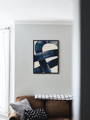 blue abstract art print in minimalis living room