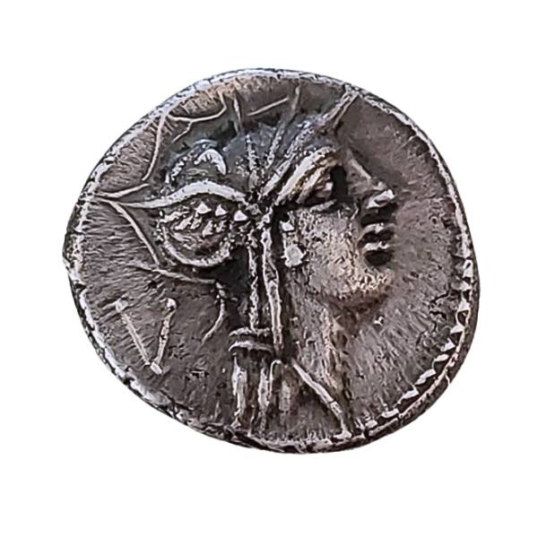 Ancient Roman silver coin with image of the goddess Roma.