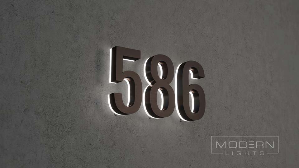 Bronze letters plaster wall