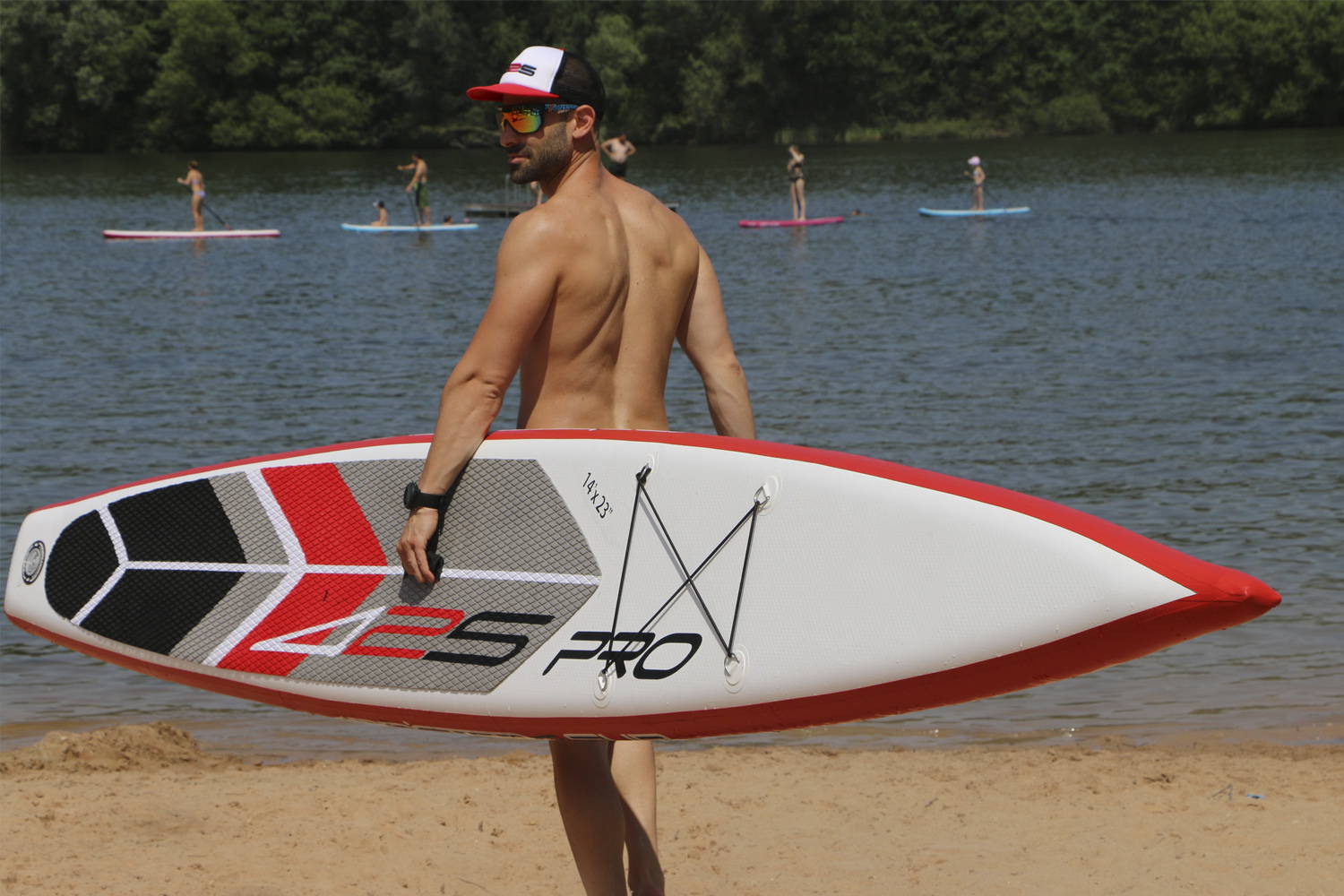 425pro Air SUP Race Board: Man carrying the board