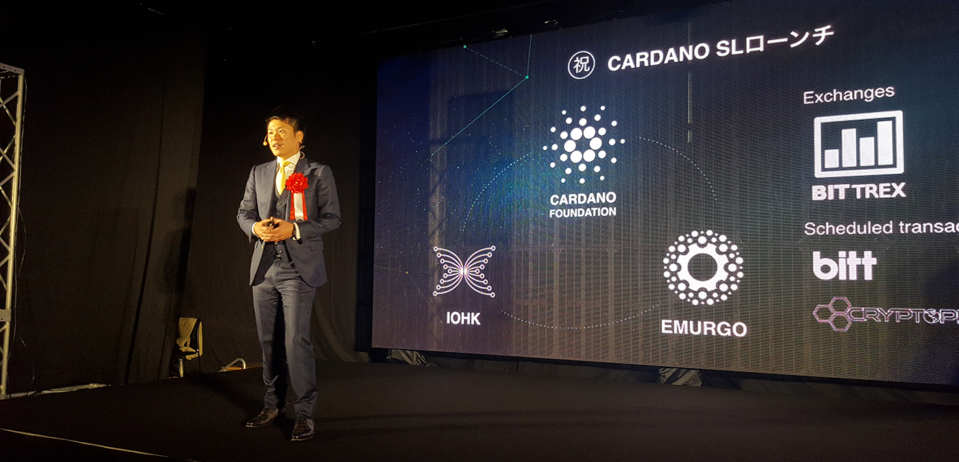 Ken Kodama speaking at Cardano launch event