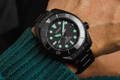 Night vision Seiko Turtle on a man wrist