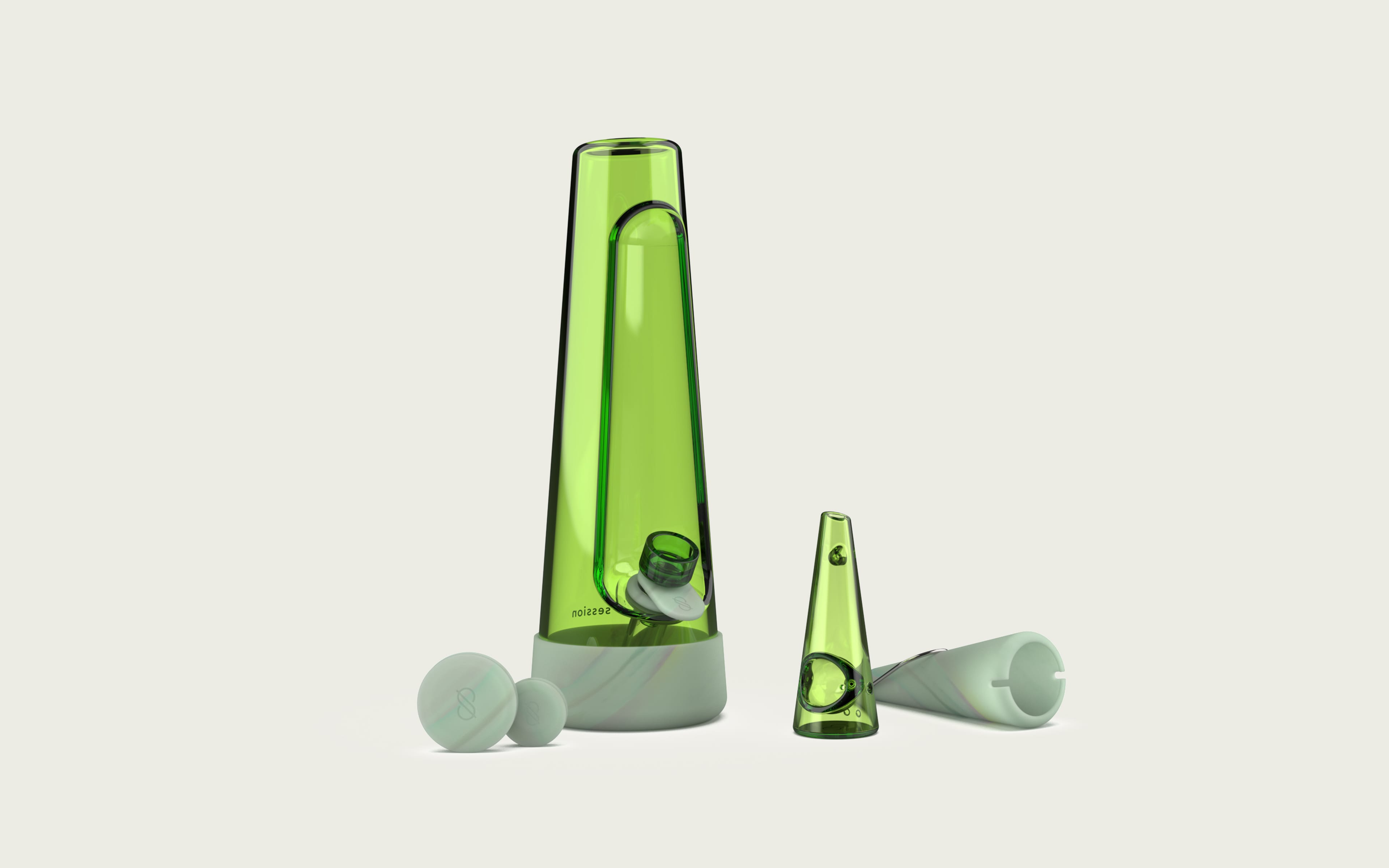 green tinted glass bong with a swirled glow-in-the-dark silicone with studio lights on