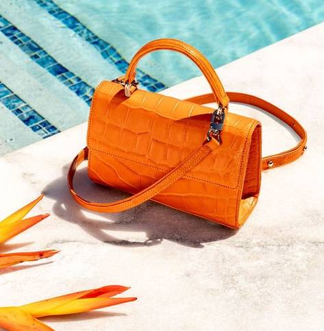 piper & skye nolita crossbody handbag with gold and black chain strap