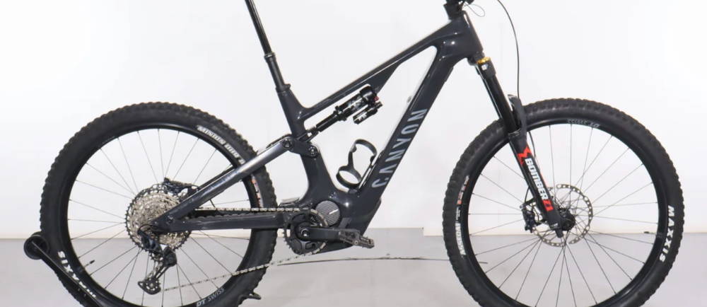 a black Canyon Spectral CF 9 E-Bike full suspension electric mountain bike