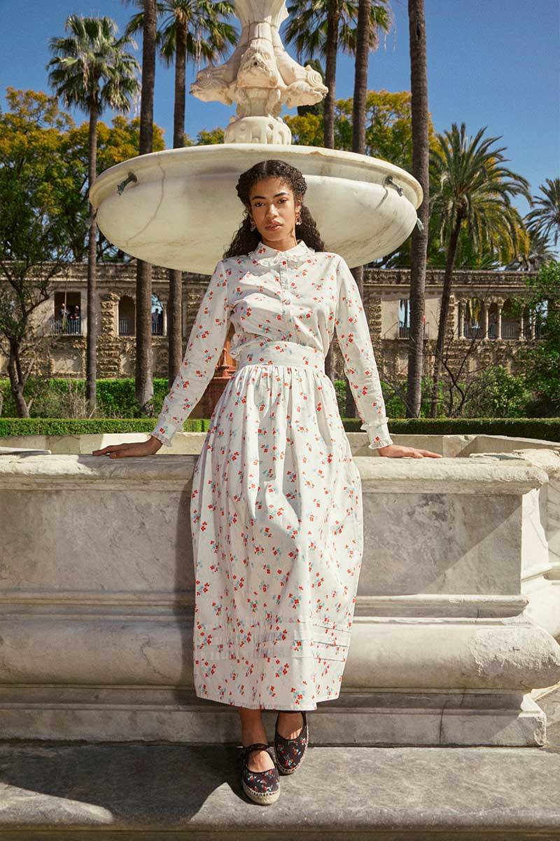 Model wears YOLKE Blossom Print Prairie Shirt & matching Bushka Skirt with Penelope Chilvers Africa Espadrilles