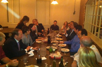 Greg Friedman and Joel Bruckenstein at Tom Giachetti's dinner, at which the Chianti flowed freely.