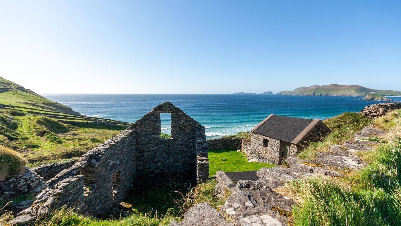 Bambina Ireland Travel Guide Countryside Patchwork Farms and Stone Houses Overlooking Ocean