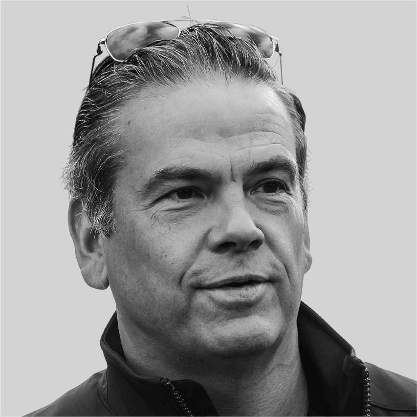 Image may contain: Lachlan Murdoch, Face, Head, Person, Photography, Portrait, Adult, Body Part, Neck, Happy, and Smile