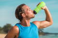 man-rehydrating-after-workout