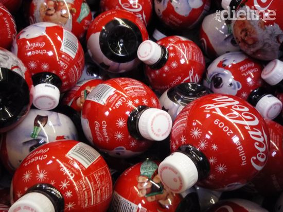 Coca Cola 2009 holiday ornament bottles