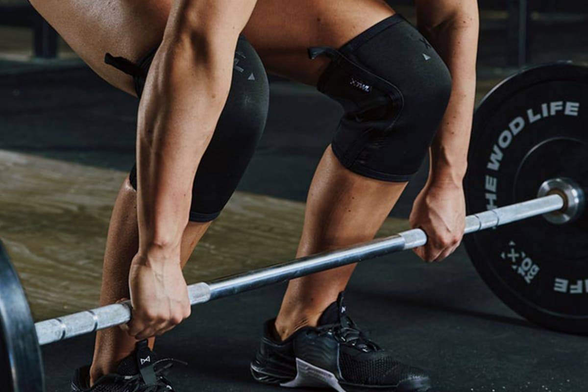 Weightlifter Wearing Knee Sleeves Deadlifting