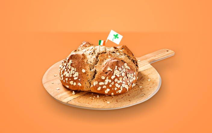 Freshly baked Irish soda bread on a wooden paddle (preview)