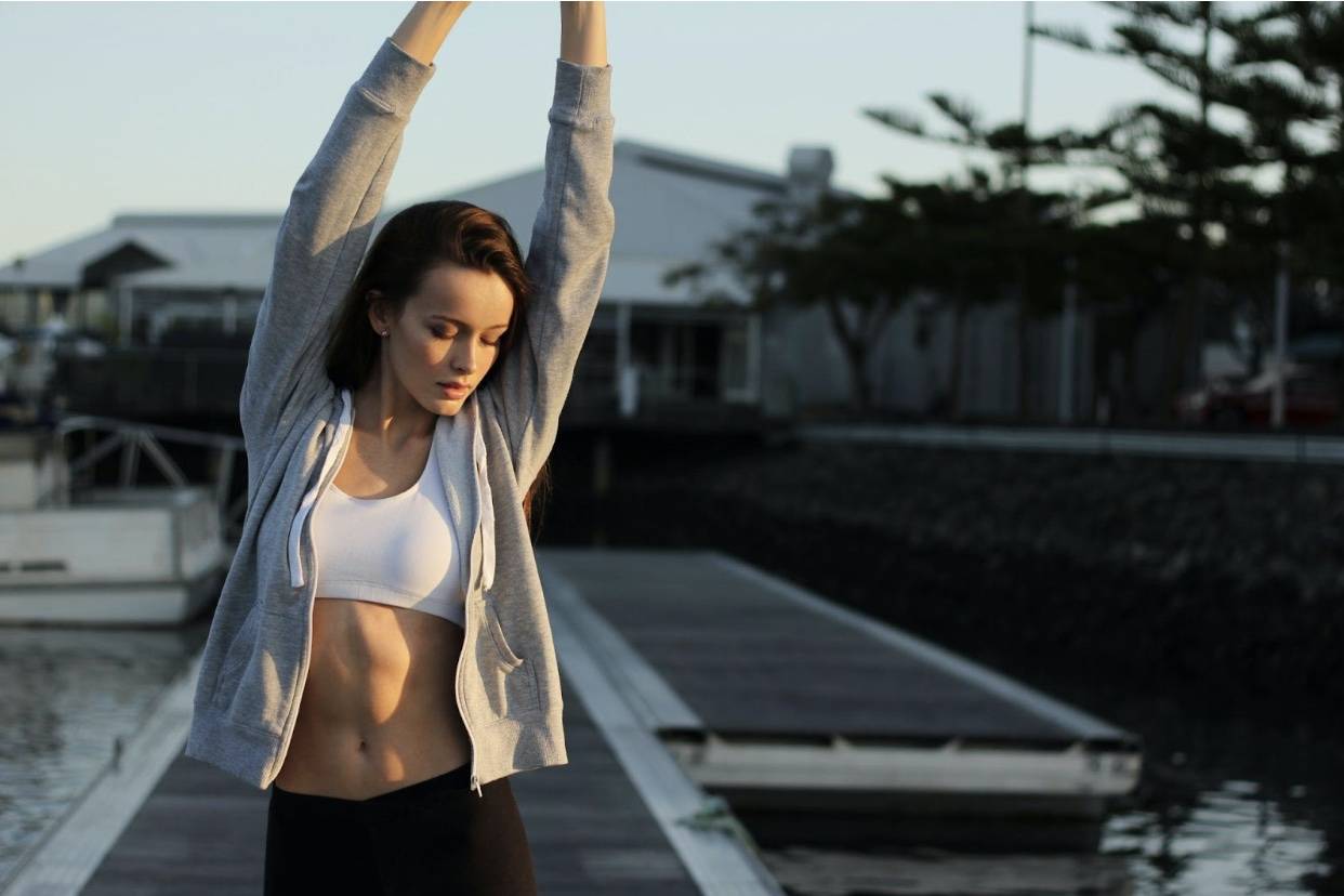 woman stretching outdoors