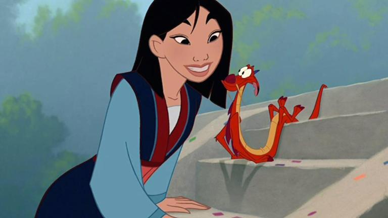 Mulan taking to Mushu on the steps of a temple.