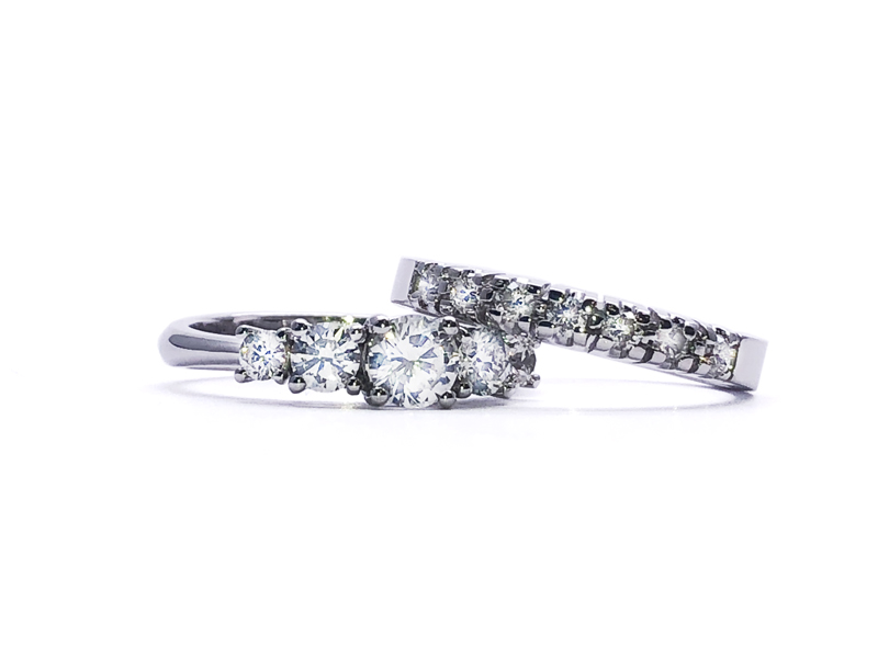 Two semi-eternity rings in white gold