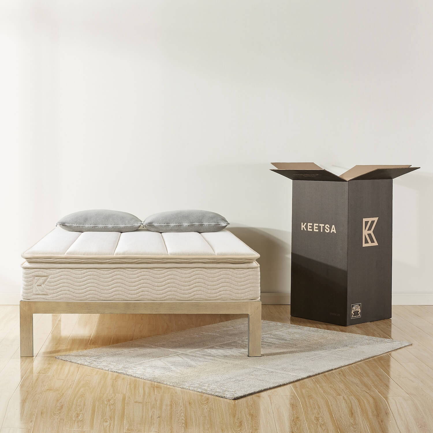 The Keetsa Plus Mattress in bedroom.