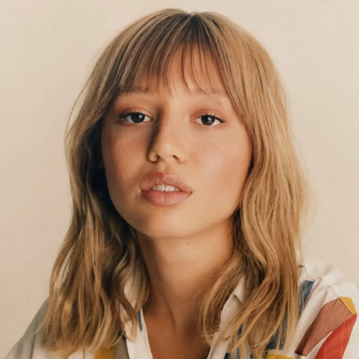 Davines hair model with honey-colored hair