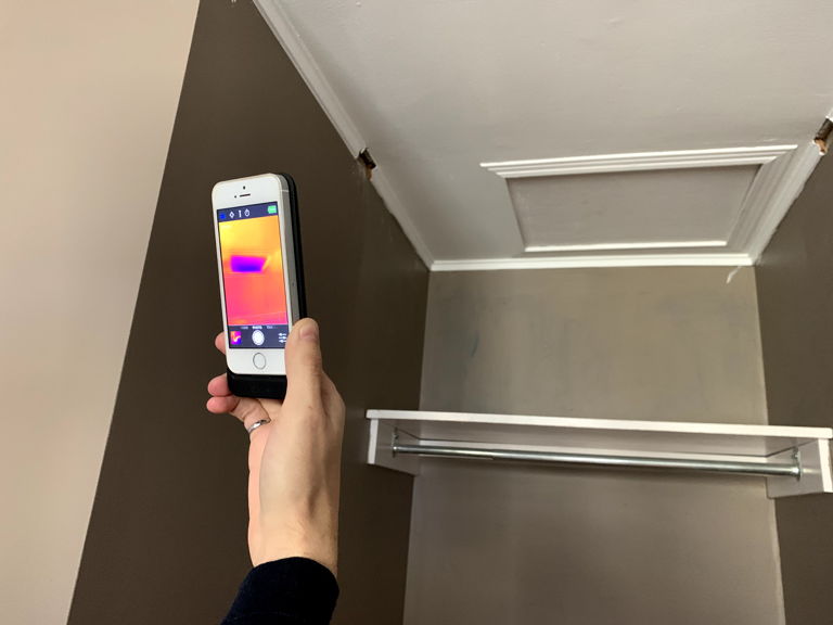 smartphone with thermal reading of attic hatch