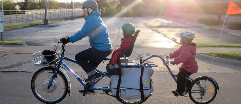 Yuba cargo bike with child seat and follow along
