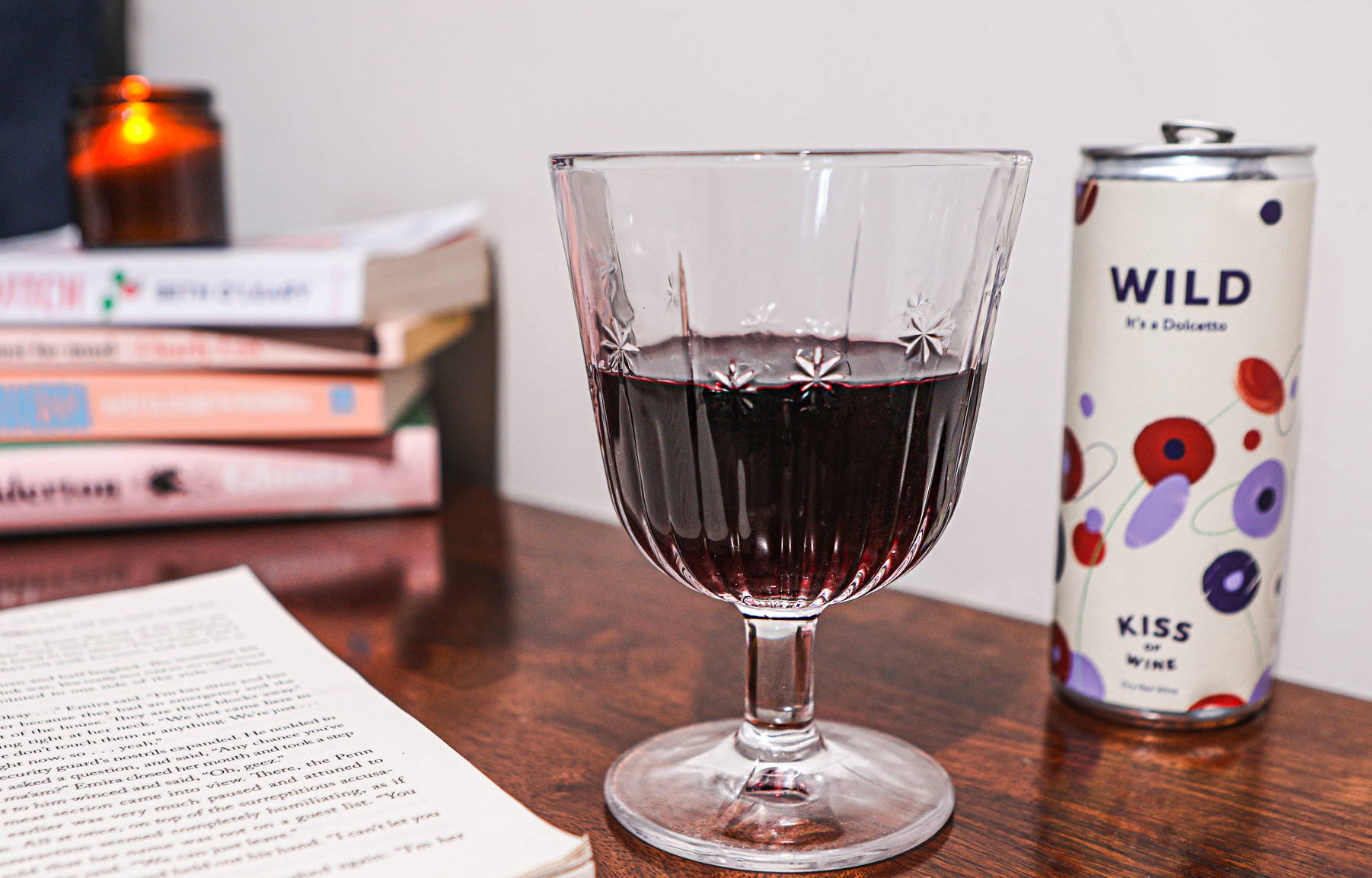 Filled glass of  Wild Dolcetto alongside the emptied can highlighting the time for cooling between refrigeration and serving temperature. 