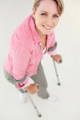 woman walking with forearm crutches