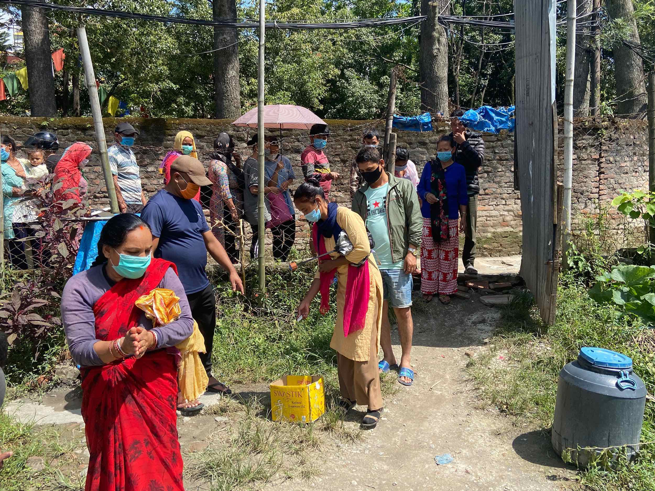 People queue for support from ROKPA