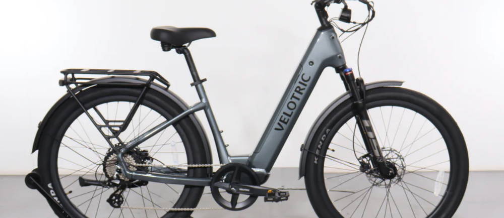 a gray Velotric Discover 2 electric city bike