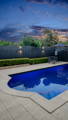 Pool lighting and outdoor wall lights creating a calm backyard setting in Rouse Hill by Havit