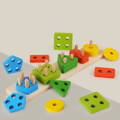 A blue, red, green and yellow pieces of the Montessori Building Blocks toy on display.