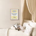 Custom baby name prints gift in yellow and framed with a natural wood frame.