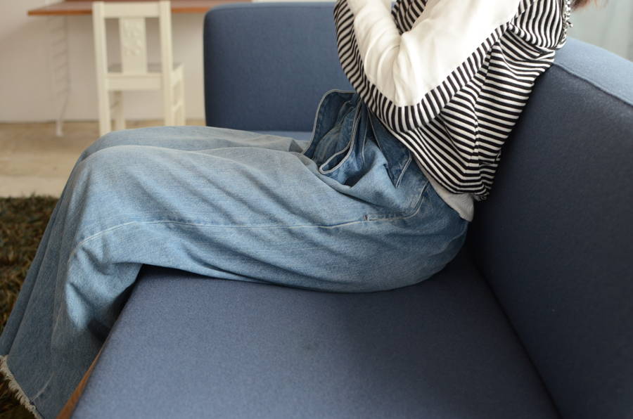 Luu Sofa に腰かける人