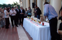 Judges sample the mojitos.