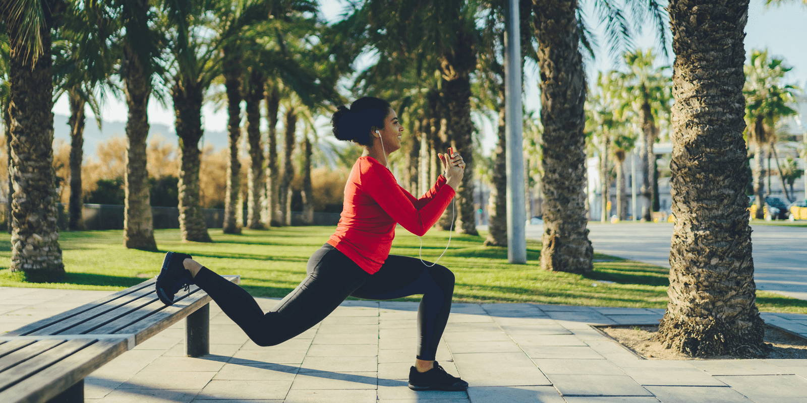 Woman doing yoga in a park.