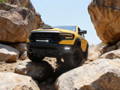 yellow ram trx with off road led lights bars