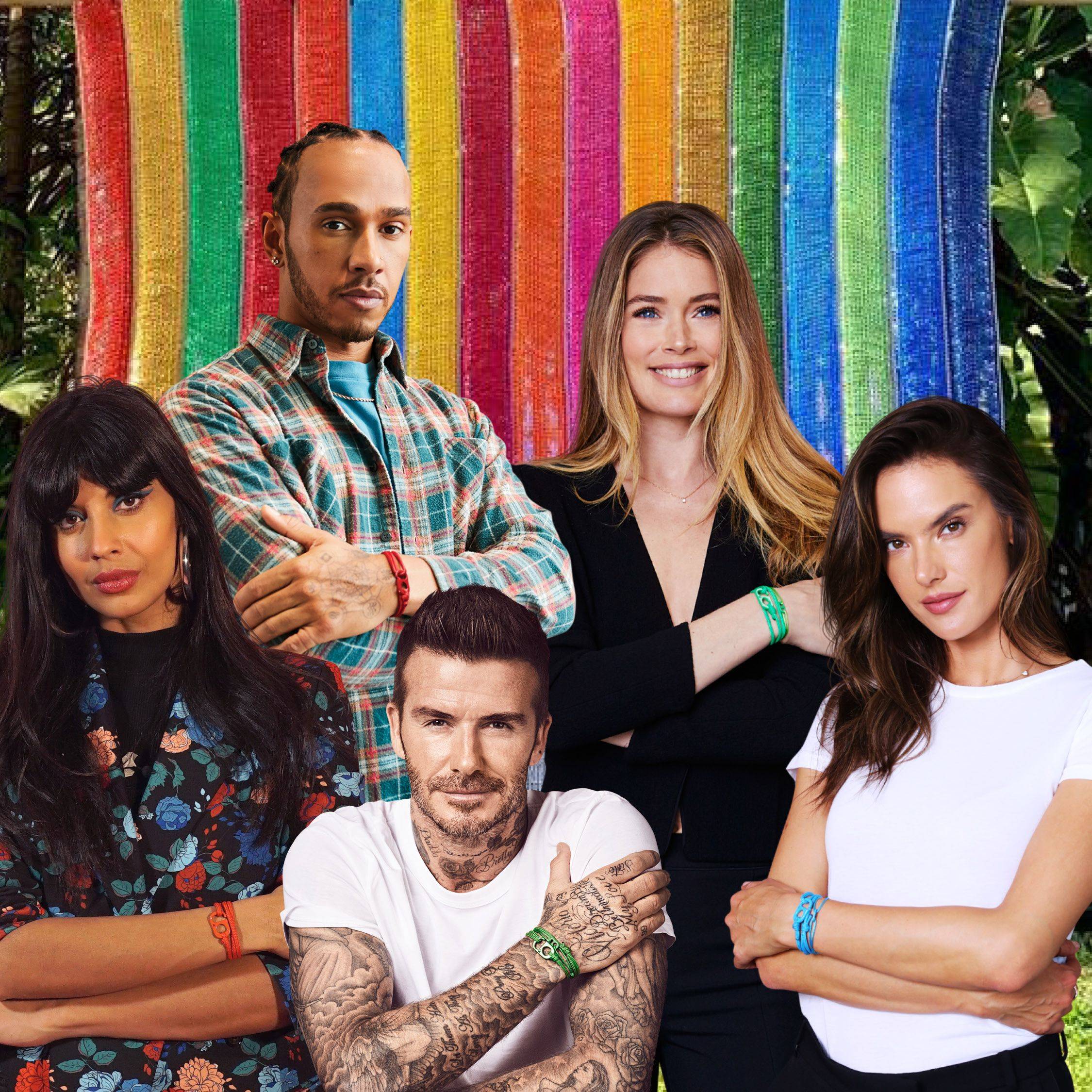 Lewis Hamilton Doutzen Kroes Alessandra Ambrosio David Beckham and Jameela Jamil in front of the #TOGETHERBAND tapestry