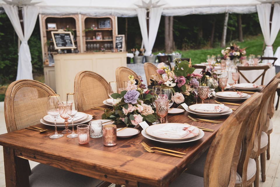 farm table with colorful floral centerpieces