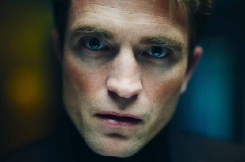 Image may contain: Robert Pattinson, Head, Person, Face, Photography, Portrait, Adult, Skin, Body Part, and Jaw