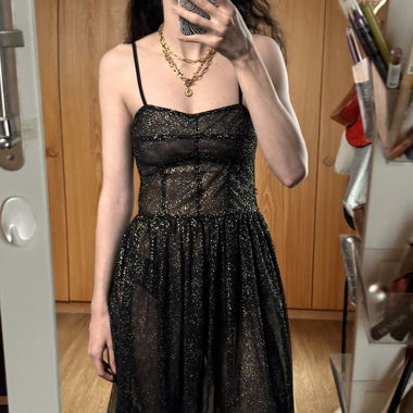 Festive black tulle dress with gold polka dots 
