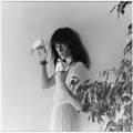 Patti Smith holding birds on her hands