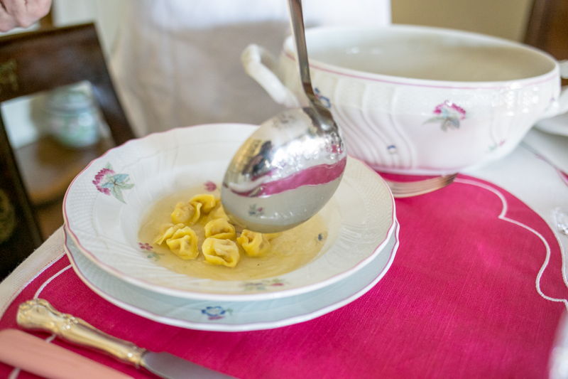 Folding perfect tortellini, served in two ways: traditional broth, and creamy Parmesan sauce.