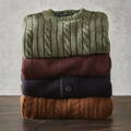 stack of men's knitwear to be stored