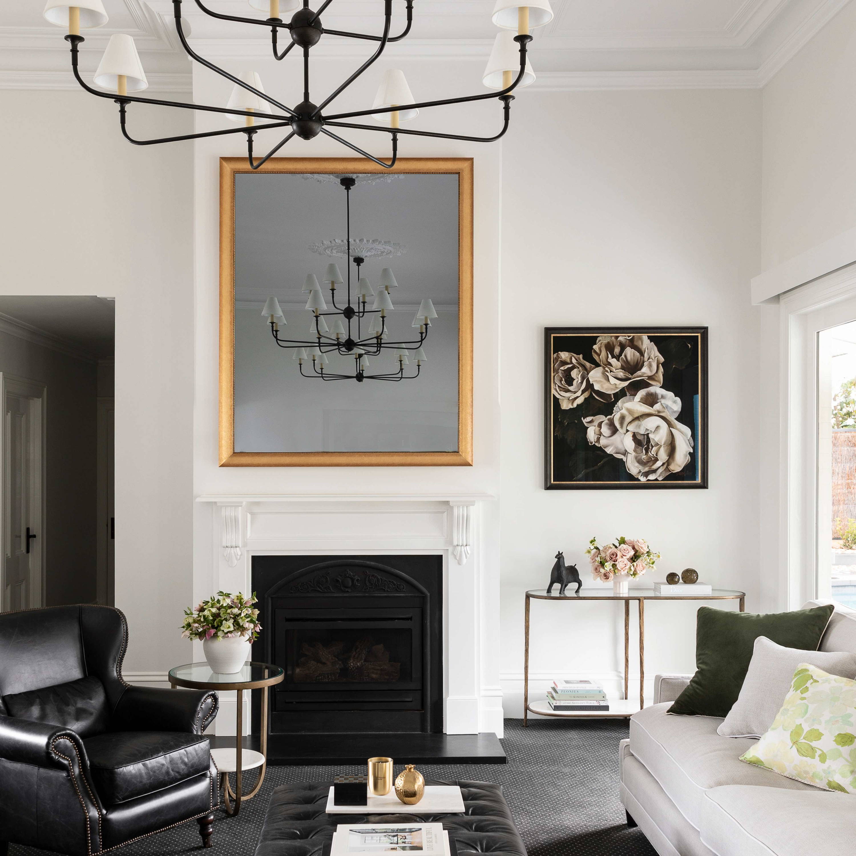 Vertical TV-Mirror in Gold Leaf Frame by FRAMING TO A T - A formal lounge setting with TV disguised behind a vertical gold mirror