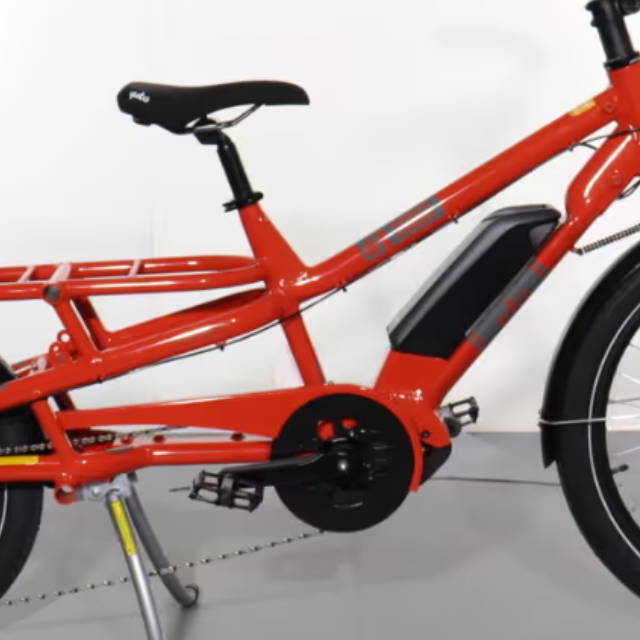 a red Yuba Spicy Curry Cargo E-Bike electric cargo bike